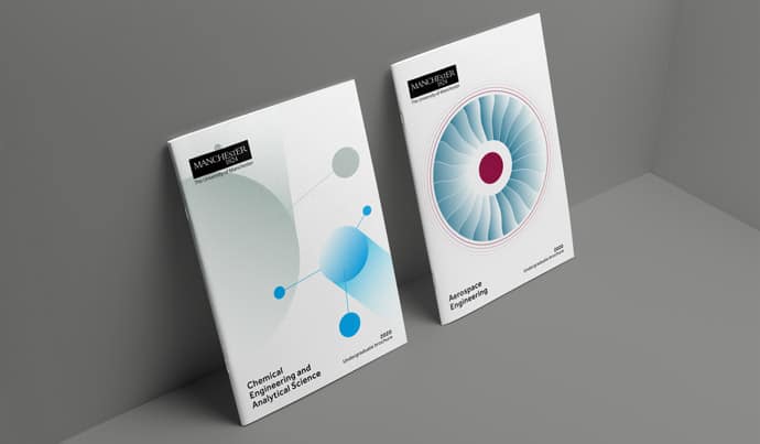 Chemical Engineering and Analytical Science brochure, and Aerospace Engineering brochure. Both have an abstract visual representation of each course on the cover. They are positioned upright against a grey background.